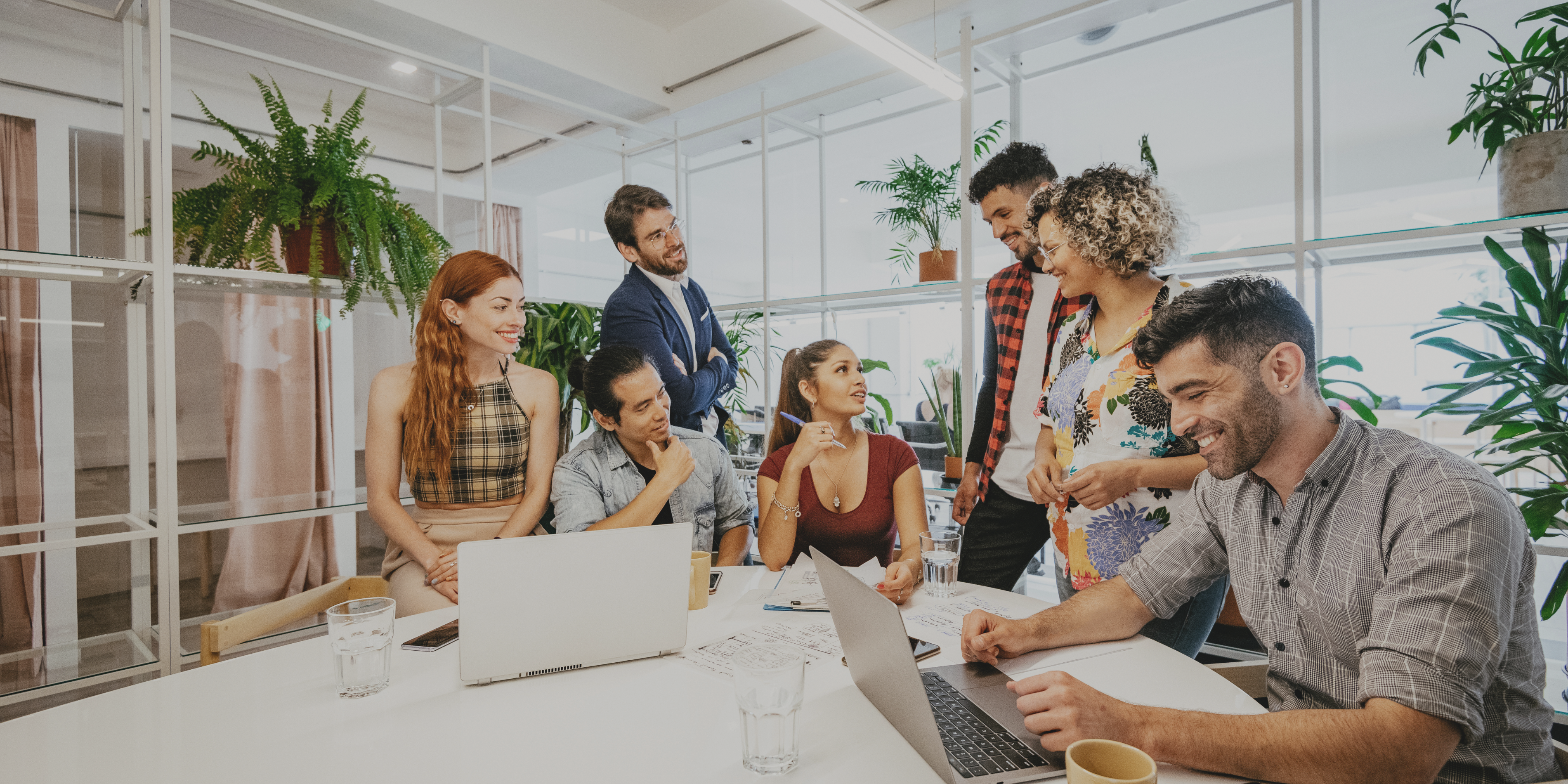 Youngsters brainstorming in a meeting room
