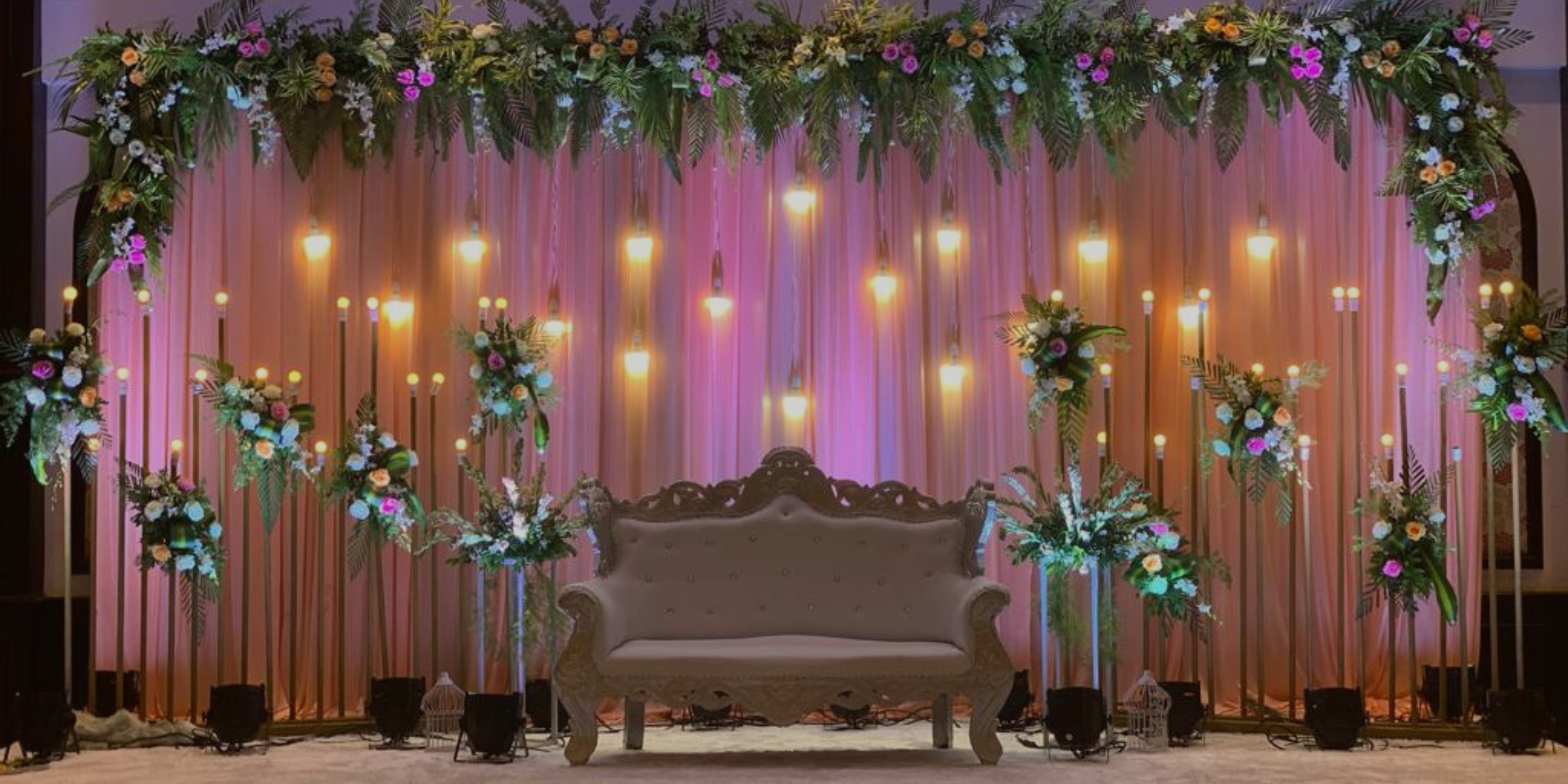 Wedding Reception Decor with flowers and light bulbs